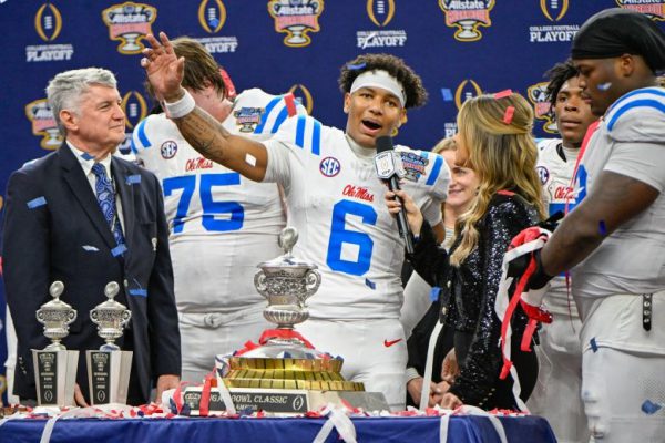 Как жизнь в небольшой футбольной команде-лидере превратила квотербека Ole Miss Тринидада Чамблисса в звезду на самой большой сцене.