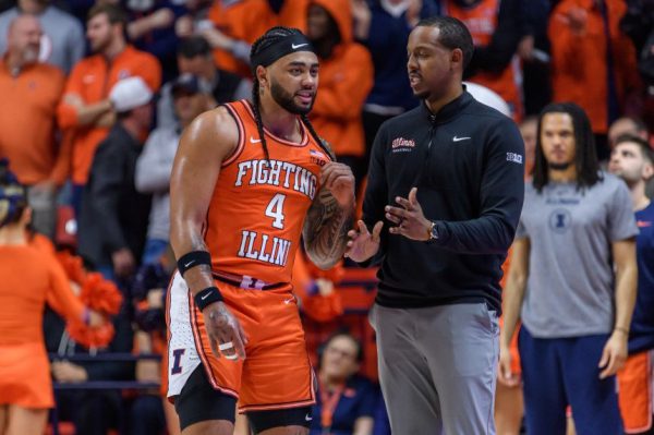 «Мы чуть не потеряли их обоих»: Кэмрин Крокер рассказывает, как ее жена и новорожденный ребенок боролись за жизнь во время выступления команды Иллинойса в Финале четырех.